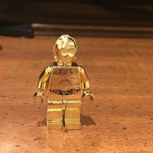It is a golden 3po from a antique Lego set